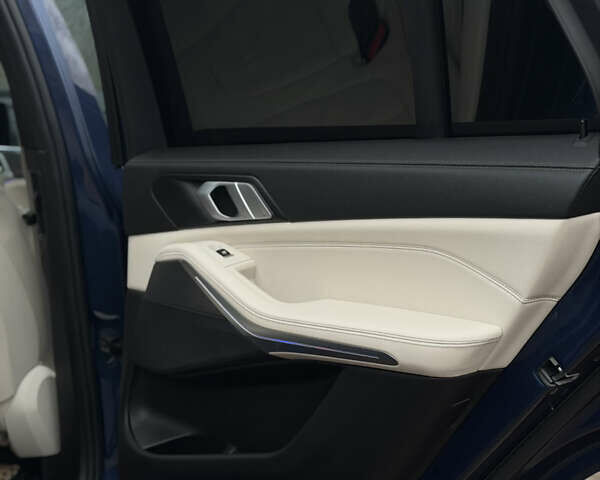 Синій БМВ Х5, об'ємом двигуна 3 л та пробігом 57 тис. км за 59999 $, фото 43 на Automoto.ua