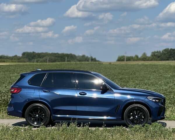 Синий БМВ Х5, объемом двигателя 3 л и пробегом 70 тыс. км за 48299 $, фото 2 на Automoto.ua
