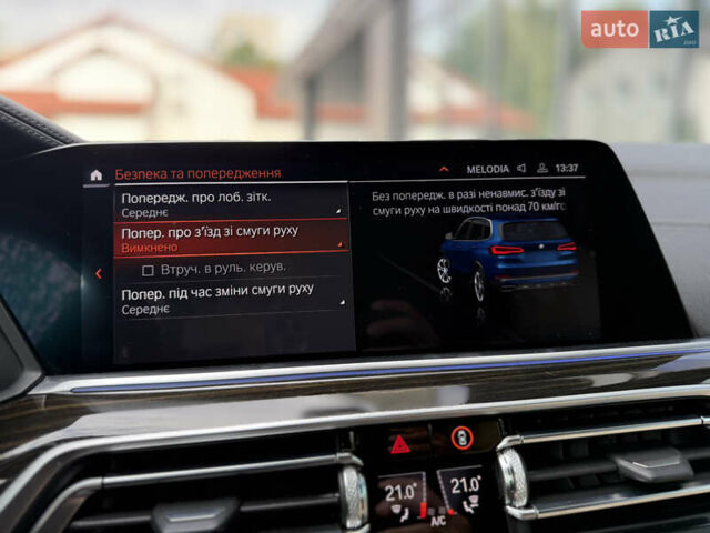 Синий БМВ Х5, объемом двигателя 3 л и пробегом 138 тыс. км за 45900 $, фото 50 на Automoto.ua