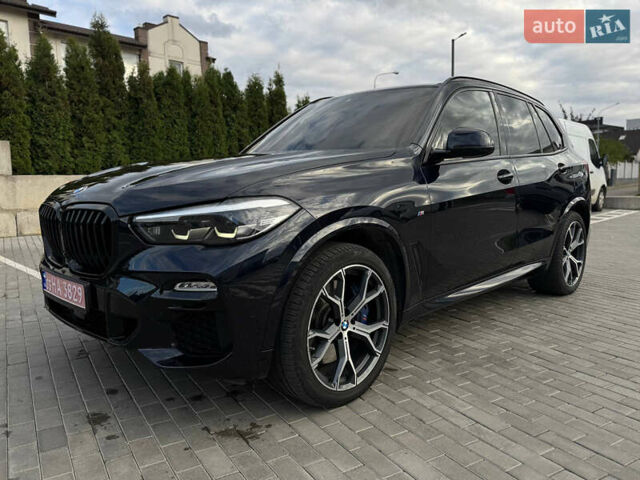 Синий БМВ Х5, объемом двигателя 3 л и пробегом 200 тыс. км за 49900 $, фото 1 на Automoto.ua