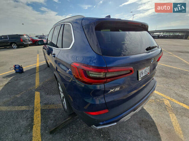 Синій БМВ Х5, об'ємом двигуна 3 л та пробігом 99 тис. км за 39900 $, фото 4 на Automoto.ua