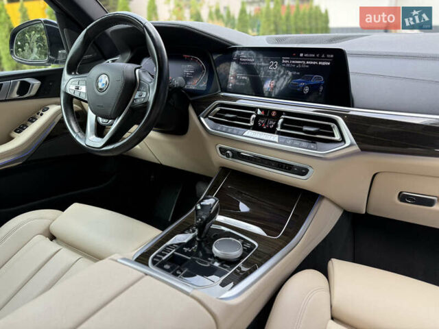 Синий БМВ Х5, объемом двигателя 3 л и пробегом 138 тыс. км за 45900 $, фото 78 на Automoto.ua