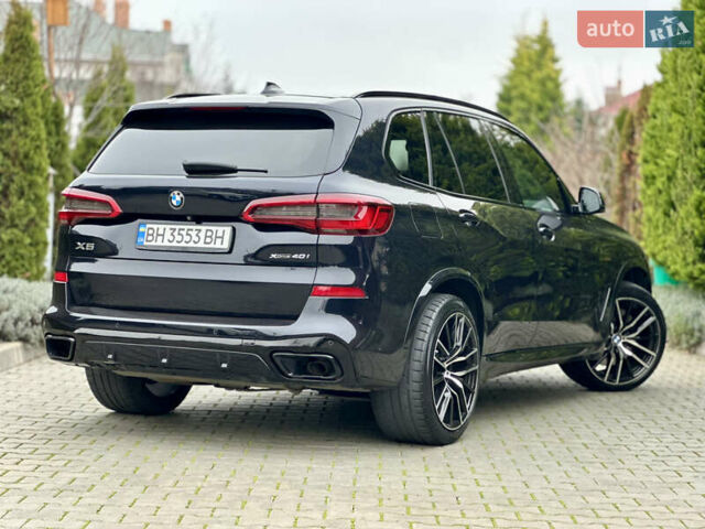 Синий БМВ Х5, объемом двигателя 3 л и пробегом 70 тыс. км за 51500 $, фото 2 на Automoto.ua