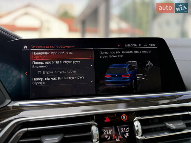 Синий БМВ Х5, объемом двигателя 3 л и пробегом 138 тыс. км за 45900 $, фото 49 на Automoto.ua