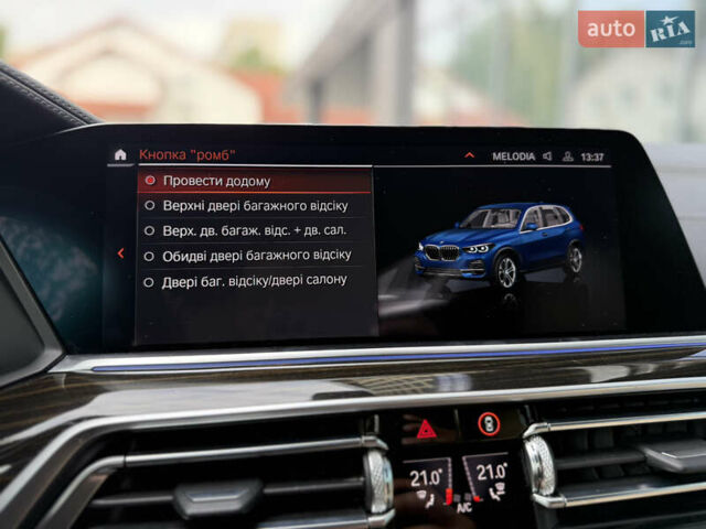 Синий БМВ Х5, объемом двигателя 3 л и пробегом 138 тыс. км за 45900 $, фото 60 на Automoto.ua