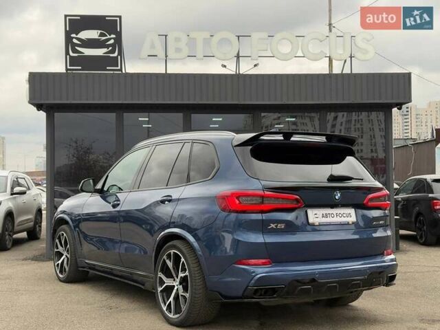 Синий БМВ Х5, объемом двигателя 4.39 л и пробегом 82 тыс. км за 58990 $, фото 4 на Automoto.ua