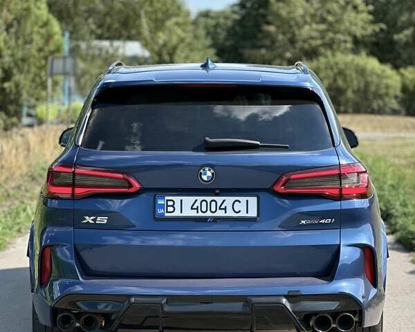 Синий БМВ Х5, объемом двигателя 3 л и пробегом 70 тыс. км за 48299 $, фото 4 на Automoto.ua