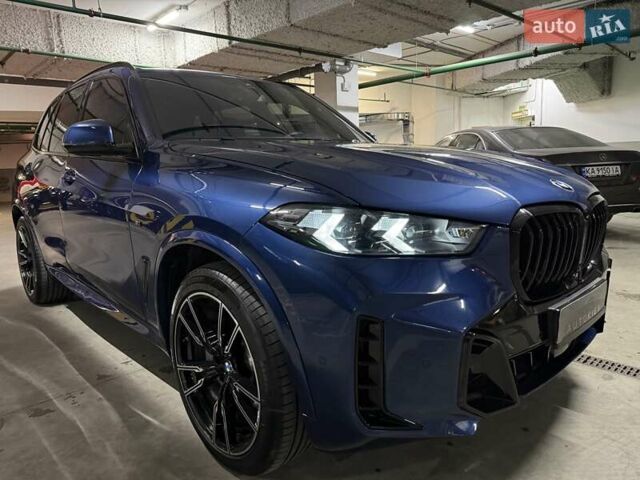 Синий БМВ Х5, объемом двигателя 3 л и пробегом 75 тыс. км за 59500 $, фото 3 на Automoto.ua