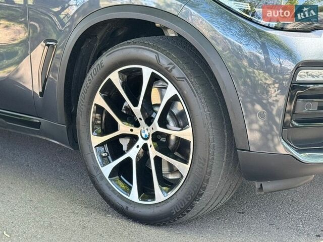 Синий БМВ Х5, объемом двигателя 3 л и пробегом 127 тыс. км за 47990 $, фото 5 на Automoto.ua