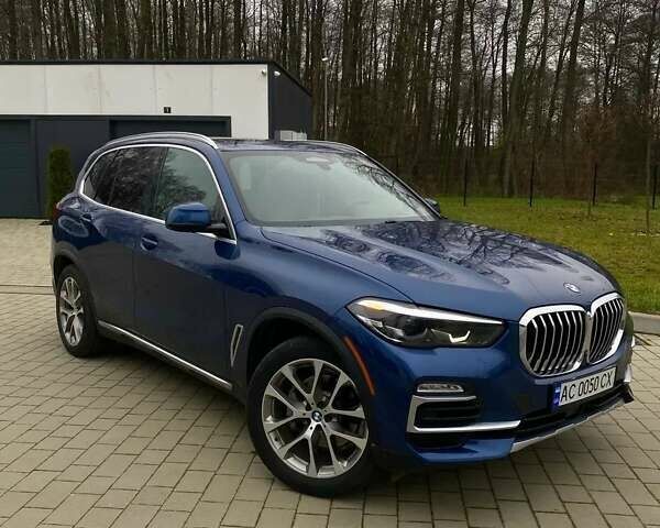 Синий БМВ Х5, объемом двигателя 3 л и пробегом 80 тыс. км за 45000 $, фото 3 на Automoto.ua