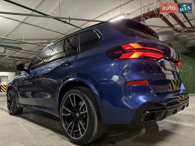 Синий БМВ Х5, объемом двигателя 3 л и пробегом 75 тыс. км за 59500 $, фото 10 на Automoto.ua