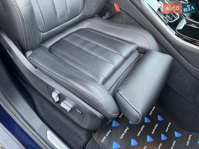 Синий БМВ Х5, объемом двигателя 3 л и пробегом 145 тыс. км за 54900 $, фото 38 на Automoto.ua
