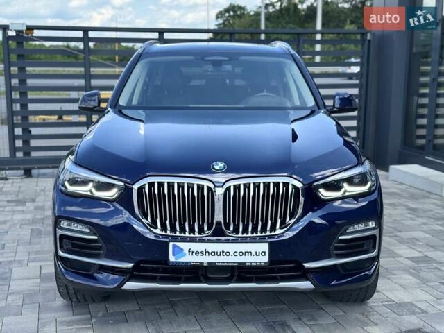 Синий БМВ Х5, объемом двигателя 3 л и пробегом 145 тыс. км за 55900 $, фото 1 на Automoto.ua
