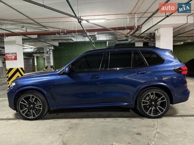 Синий БМВ Х5, объемом двигателя 3 л и пробегом 75 тыс. км за 59500 $, фото 8 на Automoto.ua
