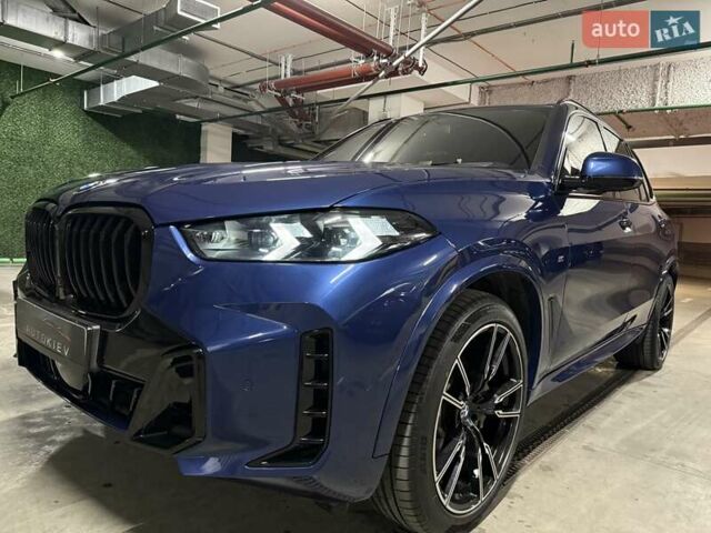 Синий БМВ Х5, объемом двигателя 3 л и пробегом 75 тыс. км за 59500 $, фото 7 на Automoto.ua