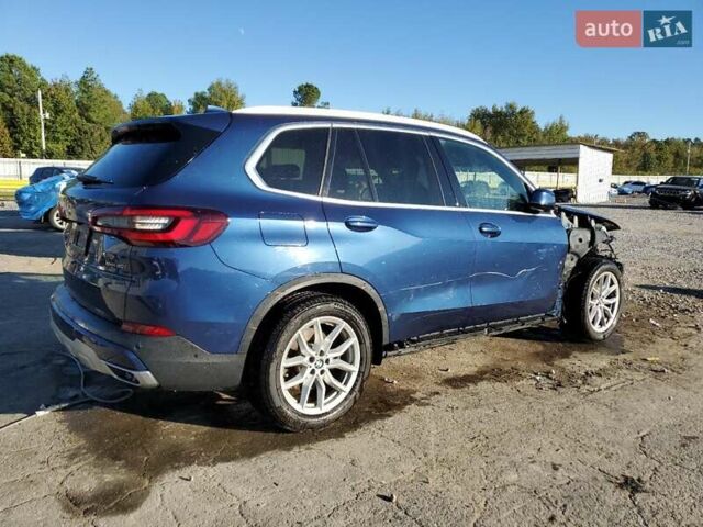 Синий БМВ Х5, объемом двигателя 3 л и пробегом 49 тыс. км за 19500 $, фото 2 на Automoto.ua