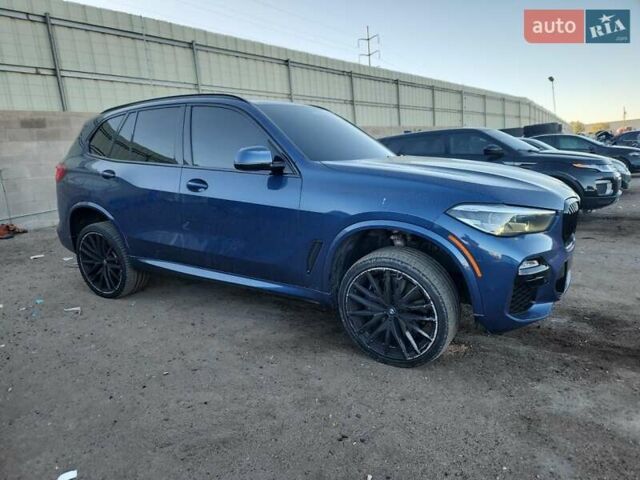 Синій БМВ Х5, об'ємом двигуна 3 л та пробігом 108 тис. км за 22000 $, фото 3 на Automoto.ua