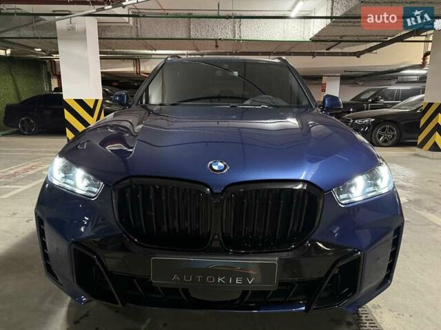Синий БМВ Х5, объемом двигателя 3 л и пробегом 75 тыс. км за 59500 $, фото 6 на Automoto.ua