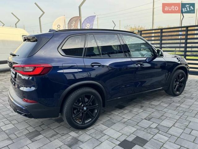 Синий БМВ Х5, объемом двигателя 3 л и пробегом 145 тыс. км за 54900 $, фото 2 на Automoto.ua