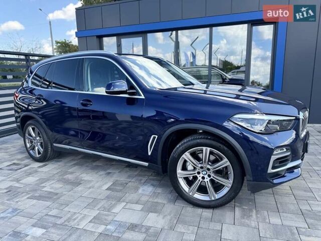 Синий БМВ Х5, объемом двигателя 3 л и пробегом 145 тыс. км за 55900 $, фото 6 на Automoto.ua