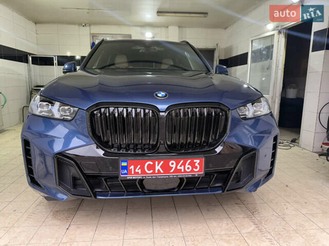 Синий БМВ Х5, объемом двигателя 3 л и пробегом 82 тыс. км за 59100 $, фото 1 на Automoto.ua