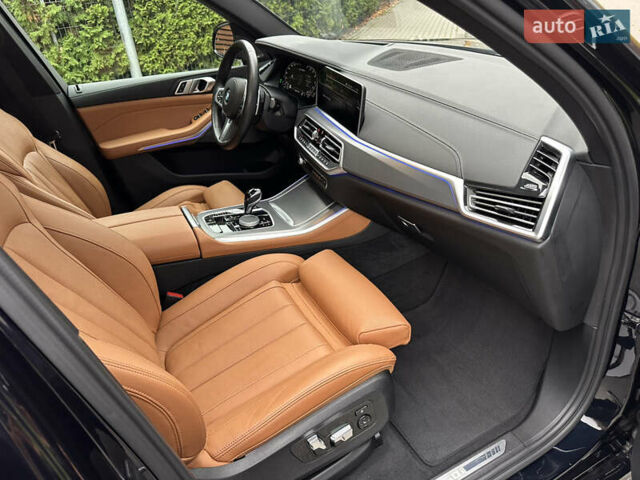 Синий БМВ Х5, объемом двигателя 4.39 л и пробегом 33 тыс. км за 61850 $, фото 38 на Automoto.ua