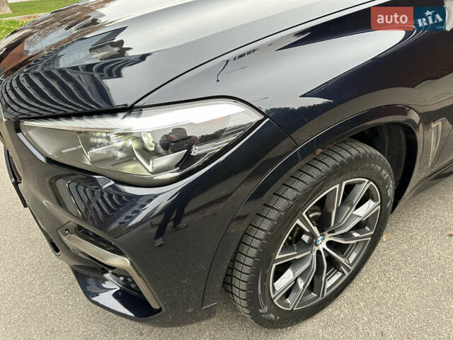 Синий БМВ Х5, объемом двигателя 4.39 л и пробегом 33 тыс. км за 61850 $, фото 5 на Automoto.ua