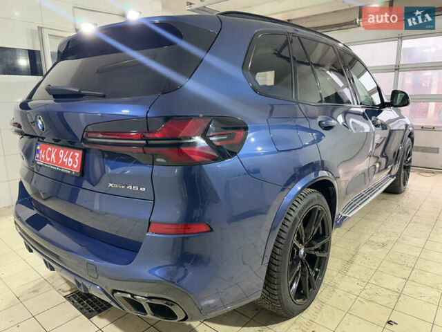 Синий БМВ Х5, объемом двигателя 3 л и пробегом 82 тыс. км за 59100 $, фото 6 на Automoto.ua
