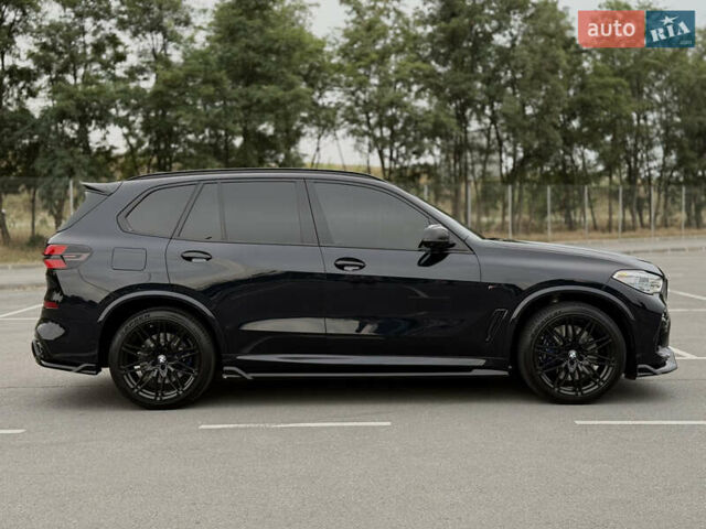 Синий БМВ Х5, объемом двигателя 3 л и пробегом 105 тыс. км за 59500 $, фото 5 на Automoto.ua