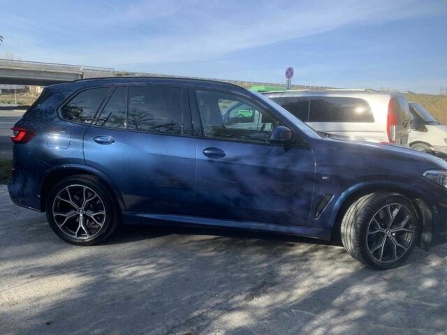 Синий БМВ Х5, объемом двигателя 3 л и пробегом 56 тыс. км за 32100 $, фото 5 на Automoto.ua