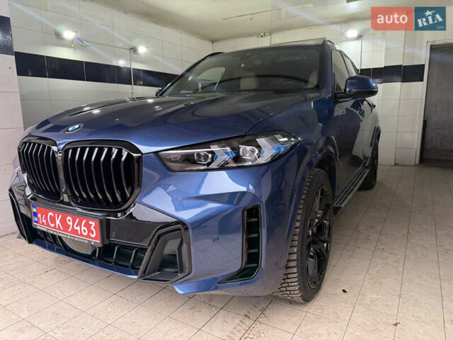 Синий БМВ Х5, объемом двигателя 3 л и пробегом 82 тыс. км за 59100 $, фото 2 на Automoto.ua