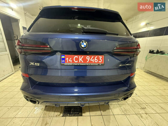 Синий БМВ Х5, объемом двигателя 3 л и пробегом 82 тыс. км за 59100 $, фото 7 на Automoto.ua