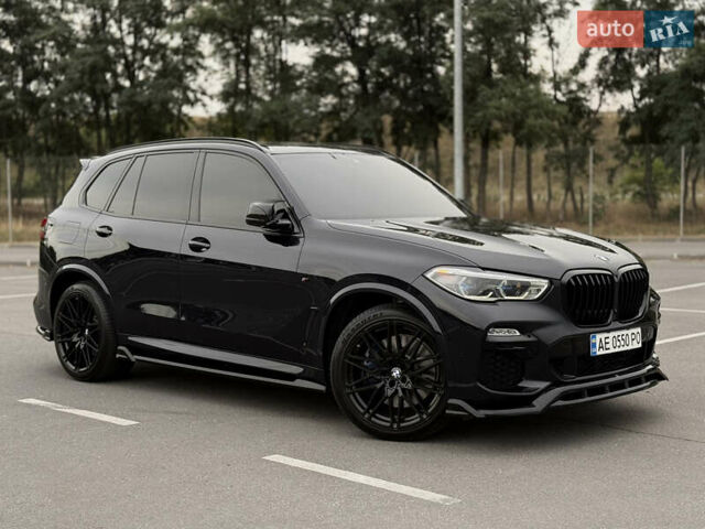 Синий БМВ Х5, объемом двигателя 3 л и пробегом 105 тыс. км за 59500 $, фото 2 на Automoto.ua