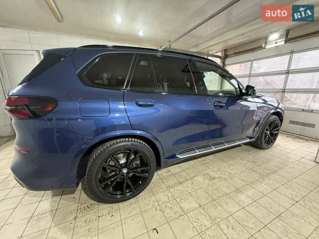 Синий БМВ Х5, объемом двигателя 3 л и пробегом 82 тыс. км за 59100 $, фото 5 на Automoto.ua