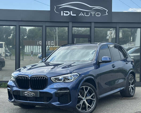 Синий БМВ Х5, объемом двигателя 3 л и пробегом 46 тыс. км за 56500 $, фото 1 на Automoto.ua