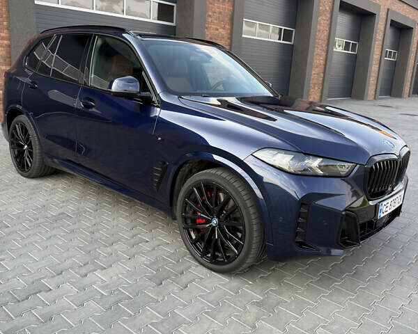 Синий БМВ Х5, объемом двигателя 3 л и пробегом 35 тыс. км за 72000 $, фото 1 на Automoto.ua