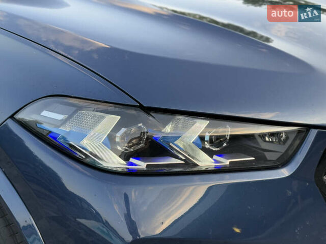 Синий БМВ Х5, объемом двигателя 3 л и пробегом 76 тыс. км за 63000 $, фото 3 на Automoto.ua