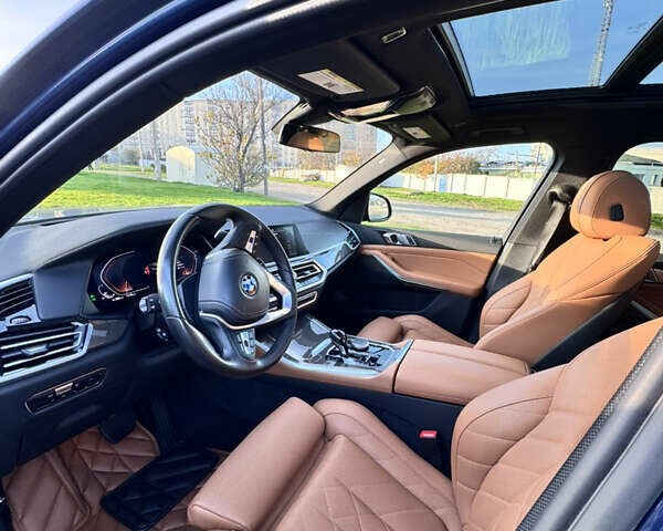 Синий БМВ Х5, объемом двигателя 3 л и пробегом 45 тыс. км за 67000 $, фото 1 на Automoto.ua