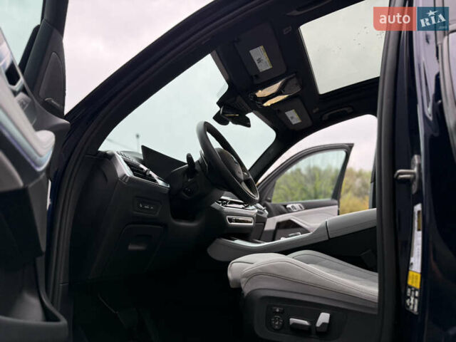 Синий БМВ Х5, объемом двигателя 3 л и пробегом 5 тыс. км за 79000 $, фото 91 на Automoto.ua