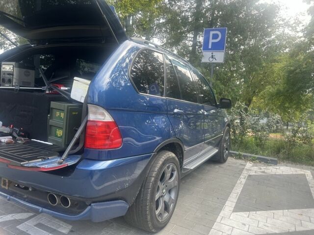 Синий БМВ Х5, объемом двигателя 4.4 л и пробегом 460 тыс. км за 9000 $, фото 3 на Automoto.ua
