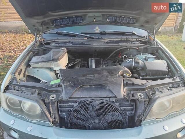 Зеленый БМВ Х5, объемом двигателя 3 л и пробегом 225 тыс. км за 8000 $, фото 10 на Automoto.ua