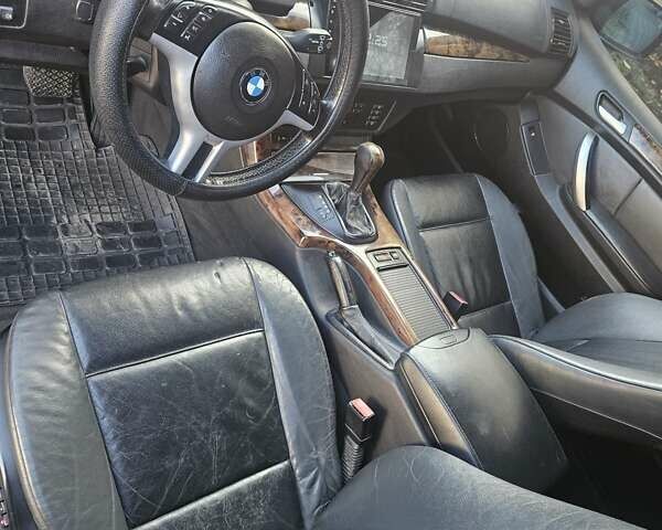 Зеленый БМВ Х5, объемом двигателя 3 л и пробегом 307 тыс. км за 4700 $, фото 5 на Automoto.ua