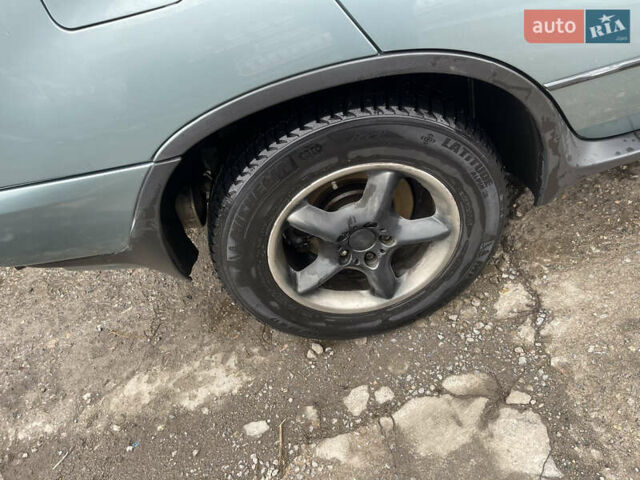 Зелений БМВ Х5, об'ємом двигуна 3 л та пробігом 500 тис. км за 8100 $, фото 6 на Automoto.ua