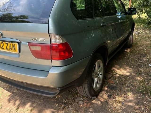 Зеленый БМВ Х5, объемом двигателя 3 л и пробегом 300 тыс. км за 4000 $, фото 1 на Automoto.ua