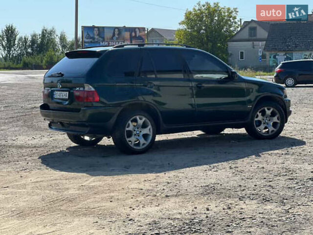 Зеленый БМВ Х5, объемом двигателя 3 л и пробегом 430 тыс. км за 6500 $, фото 4 на Automoto.ua