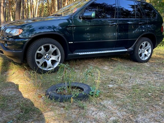 Зеленый БМВ Х5, объемом двигателя 2.9 л и пробегом 311 тыс. км за 10000 $, фото 1 на Automoto.ua