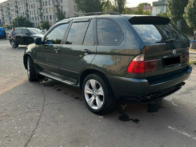 Зеленый БМВ Х5, объемом двигателя 3 л и пробегом 307 тыс. км за 5500 $, фото 6 на Automoto.ua