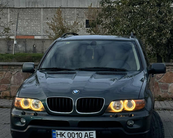 Зеленый БМВ Х5, объемом двигателя 3 л и пробегом 311 тыс. км за 10650 $, фото 1 на Automoto.ua