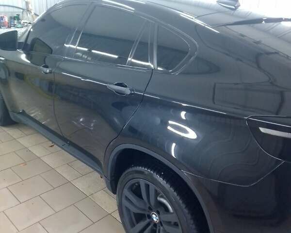 Черный БМВ Х6 М, объемом двигателя 4.4 л и пробегом 112 тыс. км за 21000 $, фото 2 на Automoto.ua