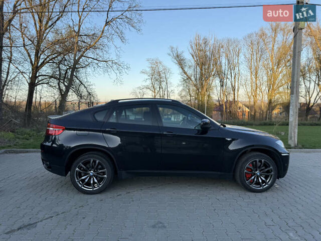 Чорний БМВ Х6 М, об'ємом двигуна 3 л та пробігом 300 тис. км за 31000 $, фото 12 на Automoto.ua